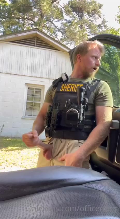 officerdom plays with his cock in public